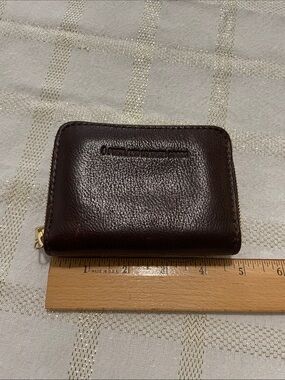 Portland Leather Goods brown wallet, gold tone zipper, inside holds coins/cards